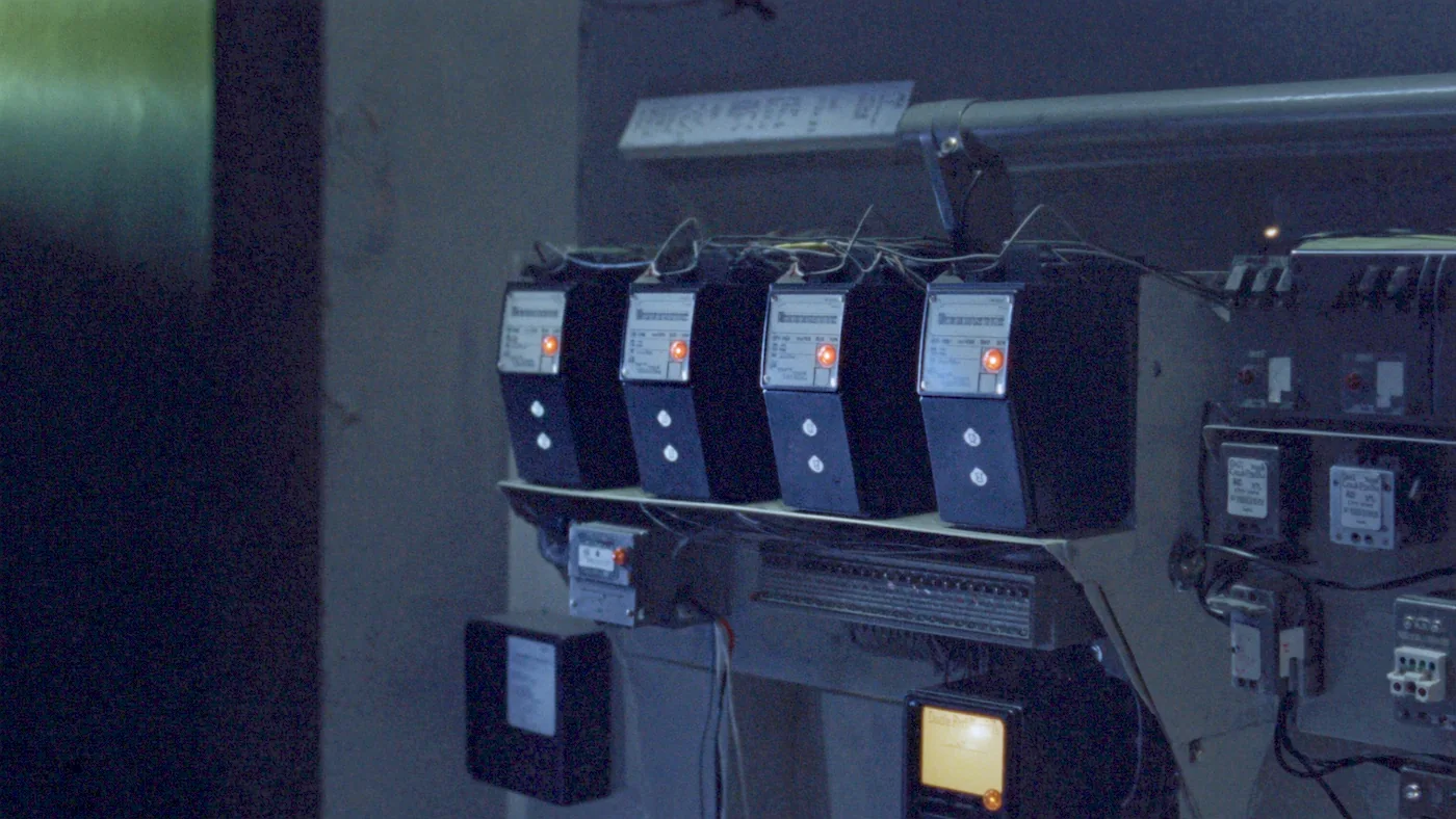 A row of pulse meters wired into a submetering panel