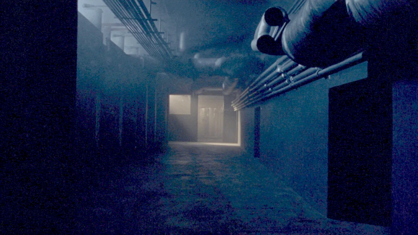 A building services corridor of insulated flow and return pipework disappearing into the dark